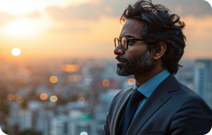 Confident businessman overlooking a city skyline, representing investors and entrepreneurs